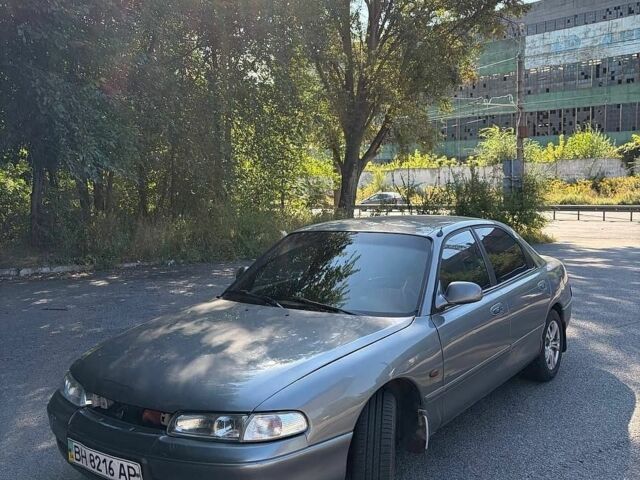 Серый Мазда 626, объемом двигателя 2 л и пробегом 374 тыс. км за 1600 $, фото 1 на Automoto.ua