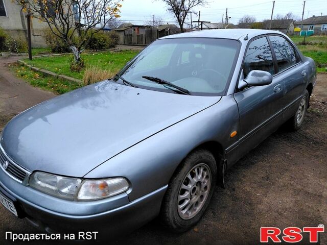 Серый Мазда 626, объемом двигателя 2 л и пробегом 297 тыс. км за 1700 $, фото 1 на Automoto.ua