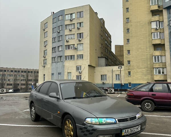 Серый Мазда 626, объемом двигателя 2.5 л и пробегом 250 тыс. км за 1500 $, фото 1 на Automoto.ua