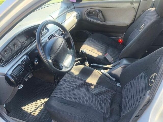 Сірий Мазда 626, об'ємом двигуна 2 л та пробігом 400 тис. км за 1700 $, фото 1 на Automoto.ua