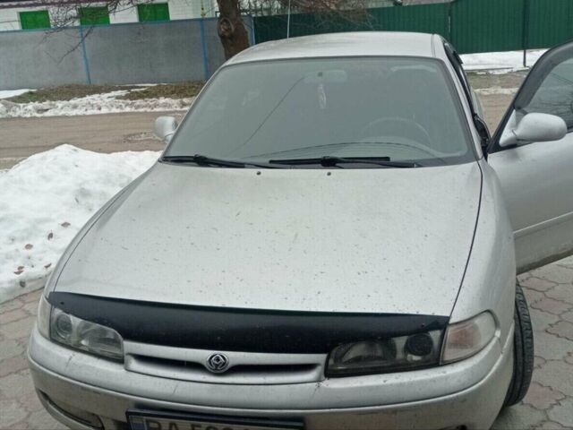 Сірий Мазда 626, об'ємом двигуна 2 л та пробігом 123 тис. км за 3300 $, фото 1 на Automoto.ua