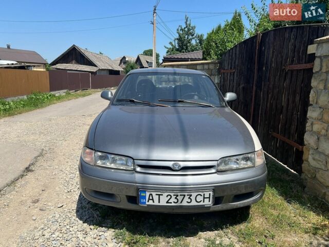 Серый Мазда 626, объемом двигателя 2 л и пробегом 263 тыс. км за 1000 $, фото 1 на Automoto.ua