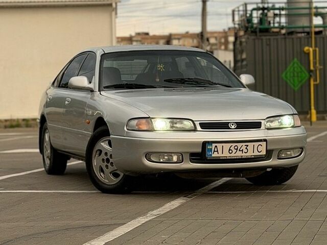 Серый Мазда 626, объемом двигателя 2 л и пробегом 290 тыс. км за 2450 $, фото 1 на Automoto.ua