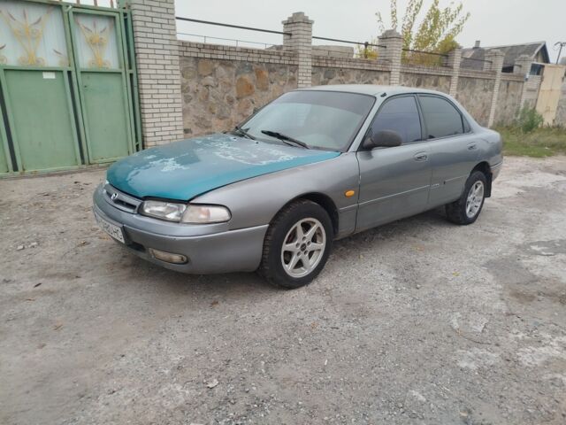 Серый Мазда 626, объемом двигателя 2 л и пробегом 100 тыс. км за 1000 $, фото 1 на Automoto.ua