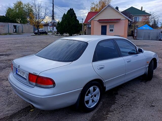 Серый Мазда 626, объемом двигателя 2 л и пробегом 250 тыс. км за 3000 $, фото 1 на Automoto.ua