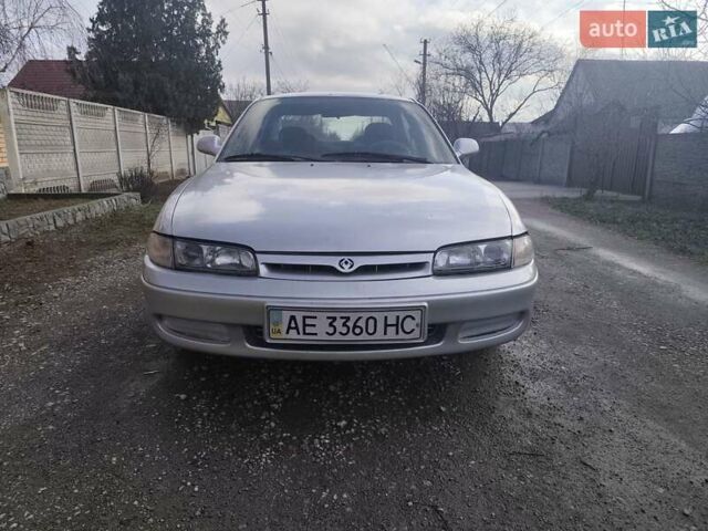 Серый Мазда 626, объемом двигателя 2 л и пробегом 333 тыс. км за 899 $, фото 1 на Automoto.ua