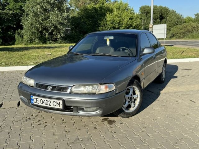 Серый Мазда 626, объемом двигателя 2 л и пробегом 490 тыс. км за 950 $, фото 1 на Automoto.ua