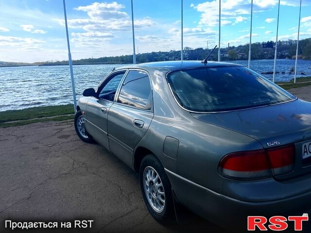 Серый Мазда 626, объемом двигателя 1.8 л и пробегом 0 тыс. км за 2000 $, фото 1 на Automoto.ua
