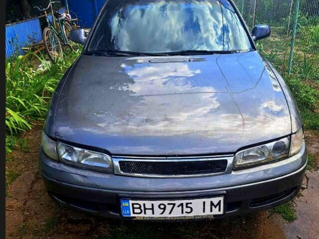 Сірий Мазда 626, об'ємом двигуна 1.8 л та пробігом 385 тис. км за 902 $, фото 1 на Automoto.ua