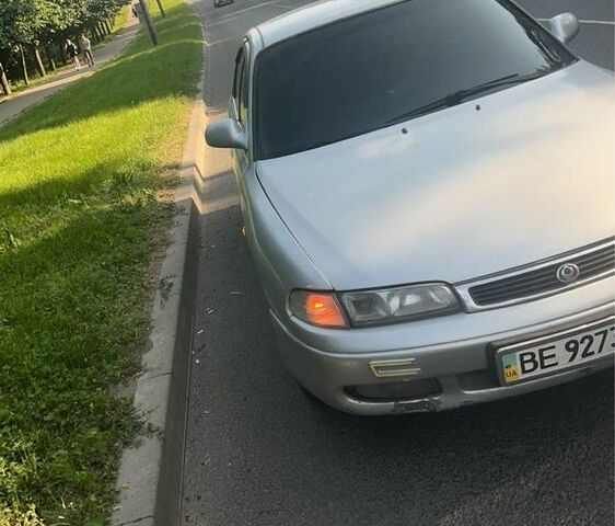 Серый Мазда 626, объемом двигателя 2 л и пробегом 350 тыс. км за 1100 $, фото 1 на Automoto.ua