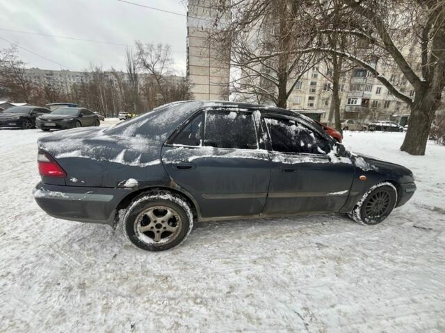 Серый Мазда 626, объемом двигателя 2 л и пробегом 380 тыс. км за 1499 $, фото 1 на Automoto.ua