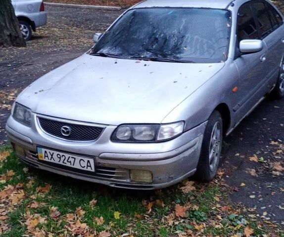 Серый Мазда 626, объемом двигателя 2 л и пробегом 2 тыс. км за 949 $, фото 1 на Automoto.ua