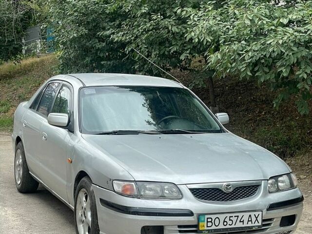 Серый Мазда 626, объемом двигателя 2 л и пробегом 380 тыс. км за 1750 $, фото 1 на Automoto.ua