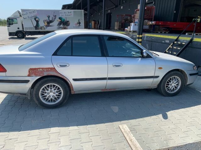 Сірий Мазда 626, об'ємом двигуна 1.8 л та пробігом 400 тис. км за 2303 $, фото 1 на Automoto.ua