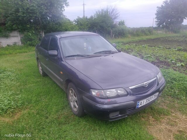 Сірий Мазда 626, об'ємом двигуна 2 л та пробігом 300 тис. км за 32256 $, фото 1 на Automoto.ua