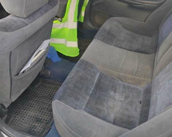 Серый Мазда 626, объемом двигателя 1.8 л и пробегом 453 тыс. км за 3100 $, фото 1 на Automoto.ua