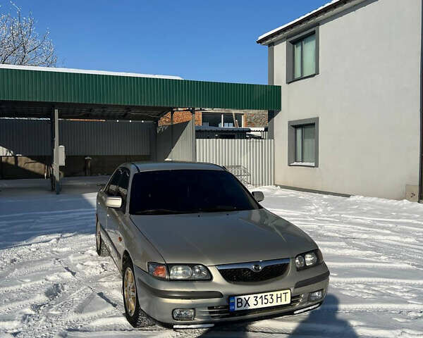 Серый Мазда 626, объемом двигателя 2 л и пробегом 397 тыс. км за 3099 $, фото 1 на Automoto.ua