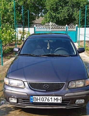 Серый Мазда 626, объемом двигателя 2 л и пробегом 360 тыс. км за 2600 $, фото 1 на Automoto.ua