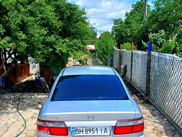 Серый Мазда 626, объемом двигателя 1.8 л и пробегом 280 тыс. км за 2400 $, фото 1 на Automoto.ua
