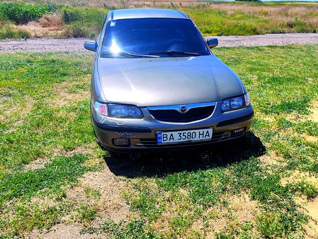 Сірий Мазда 626, об'ємом двигуна 2 л та пробігом 0 тис. км за 2000 $, фото 1 на Automoto.ua