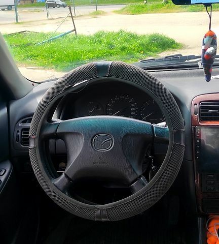 Сірий Мазда 626, об'ємом двигуна 2 л та пробігом 450 тис. км за 3500 $, фото 1 на Automoto.ua