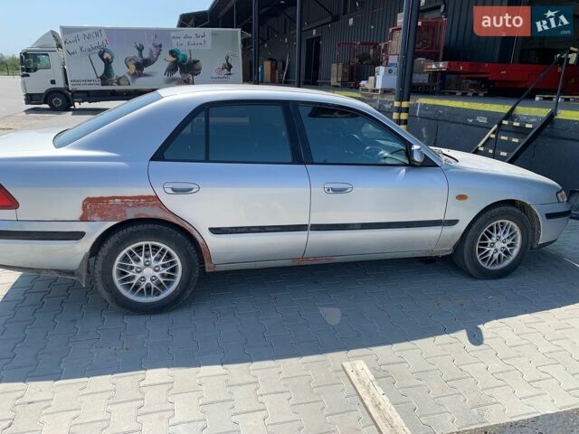 Сірий Мазда 626, об'ємом двигуна 1.8 л та пробігом 400 тис. км за 2303 $, фото 1 на Automoto.ua