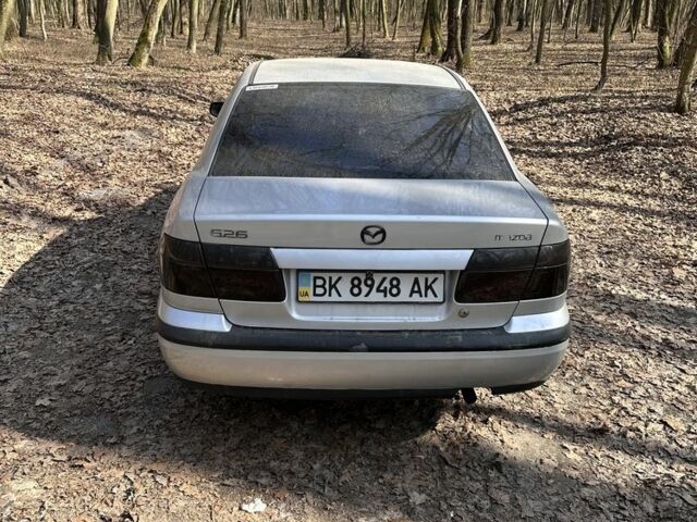 Сірий Мазда 626, об'ємом двигуна 2 л та пробігом 260 тис. км за 2400 $, фото 1 на Automoto.ua