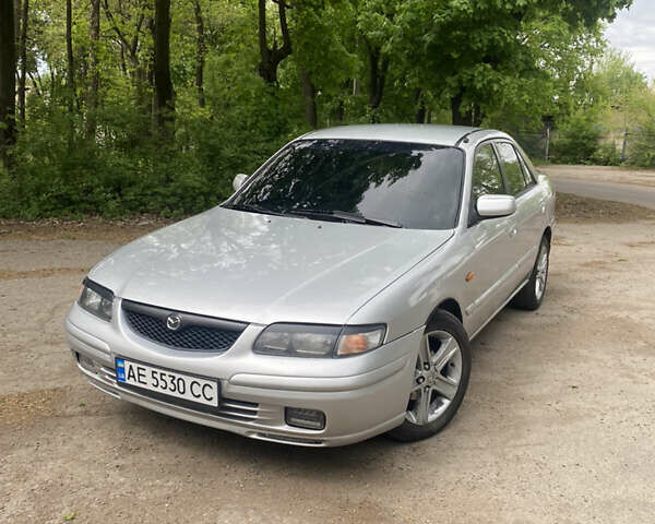 Сірий Мазда 626, об'ємом двигуна 2 л та пробігом 307 тис. км за 4100 $, фото 1 на Automoto.ua