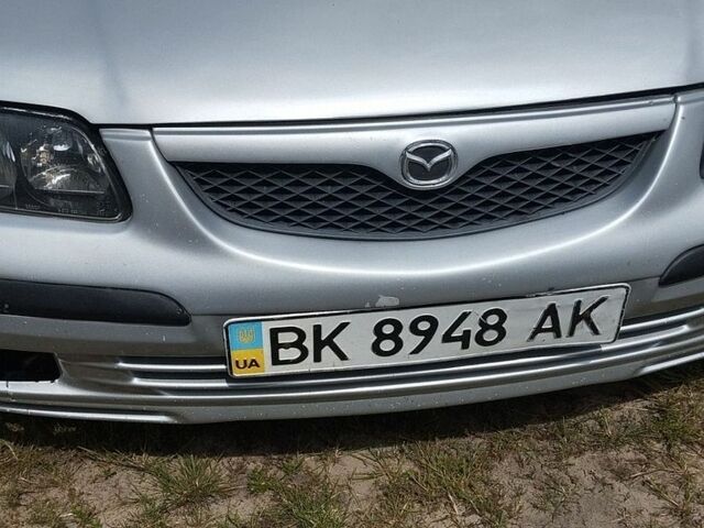 Сірий Мазда 626, об'ємом двигуна 2 л та пробігом 244 тис. км за 2050 $, фото 1 на Automoto.ua