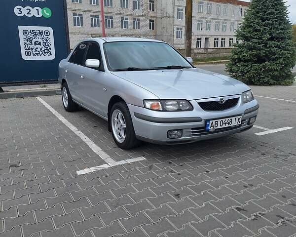 Серый Мазда 626, объемом двигателя 2 л и пробегом 319 тыс. км за 3200 $, фото 1 на Automoto.ua