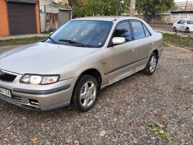 Серый Мазда 626, объемом двигателя 1.8 л и пробегом 225 тыс. км за 1200 $, фото 1 на Automoto.ua