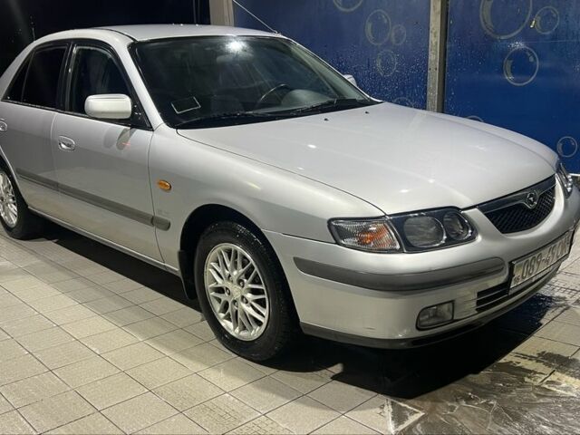 Серый Мазда 626, объемом двигателя 2 л и пробегом 105 тыс. км за 3800 $, фото 1 на Automoto.ua