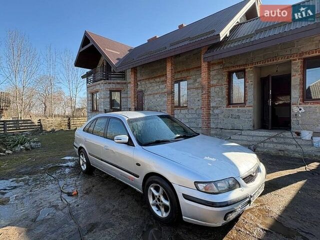 Серый Мазда 626, объемом двигателя 2 л и пробегом 300 тыс. км за 1000 $, фото 1 на Automoto.ua