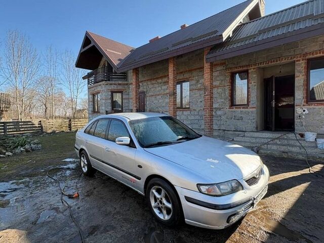 Серый Мазда 626, объемом двигателя 2 л и пробегом 300 тыс. км за 1000 $, фото 1 на Automoto.ua