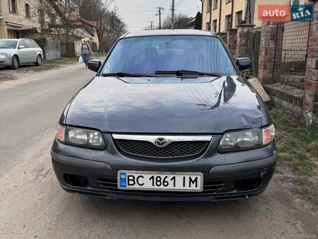 Серый Мазда 626, объемом двигателя 2 л и пробегом 243 тыс. км за 2560 $, фото 1 на Automoto.ua