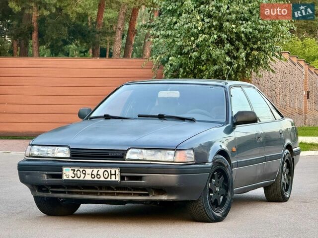 Серый Мазда 626, объемом двигателя 2 л и пробегом 234 тыс. км за 1800 $, фото 1 на Automoto.ua