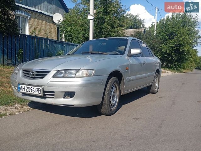 Серый Мазда 626, объемом двигателя 2 л и пробегом 300 тыс. км за 1350 $, фото 1 на Automoto.ua