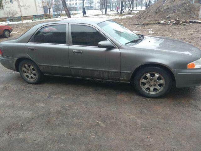 Серый Мазда 626, объемом двигателя 2 л и пробегом 282 тыс. км за 4000 $, фото 1 на Automoto.ua