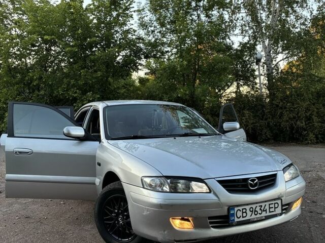 Серый Мазда 626, объемом двигателя 2 л и пробегом 395 тыс. км за 3000 $, фото 1 на Automoto.ua