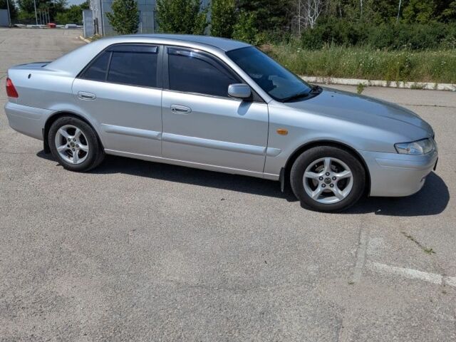 Серый Мазда 626, объемом двигателя 2 л и пробегом 172 тыс. км за 3839 $, фото 1 на Automoto.ua