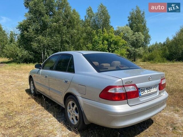 Серый Мазда 626, объемом двигателя 2 л и пробегом 345 тыс. км за 1950 $, фото 1 на Automoto.ua