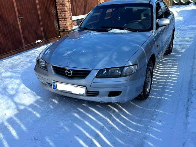 Серый Мазда 626, объемом двигателя 2 л и пробегом 120 тыс. км за 1355 $, фото 1 на Automoto.ua