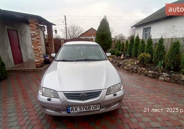 Серый Мазда 626, объемом двигателя 2 л и пробегом 341 тыс. км за 3500 $, фото 1 на Automoto.ua