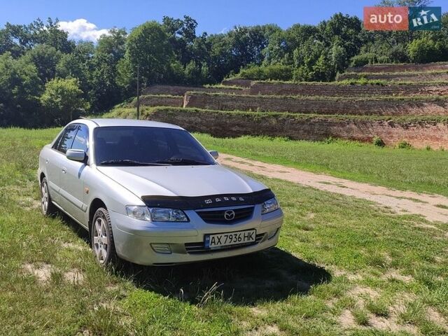 Серый Мазда 626, объемом двигателя 1.99 л и пробегом 213 тыс. км за 3000 $, фото 1 на Automoto.ua