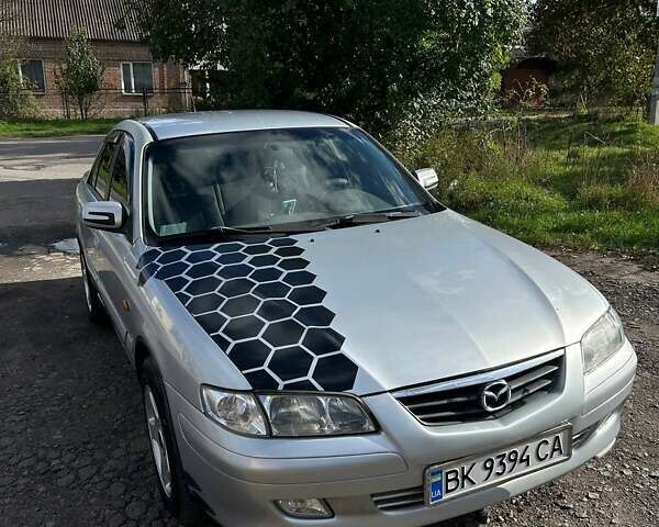 Серый Мазда 626, объемом двигателя 2 л и пробегом 295 тыс. км за 2500 $, фото 1 на Automoto.ua