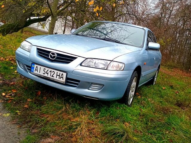 Серый Мазда 626, объемом двигателя 1.8 л и пробегом 312 тыс. км за 4500 $, фото 1 на Automoto.ua