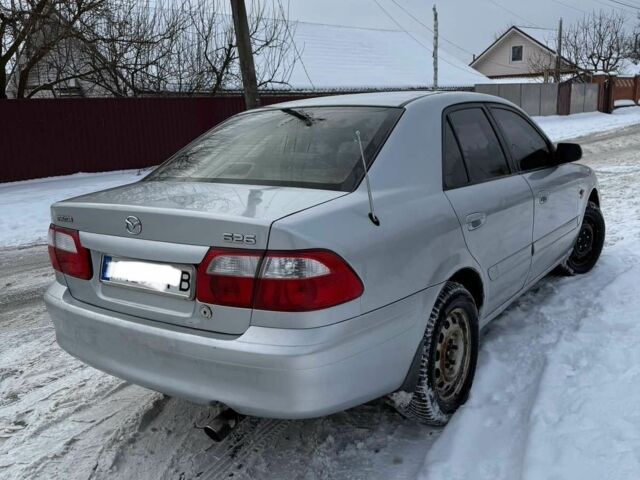 Серый Мазда 626, объемом двигателя 2 л и пробегом 400 тыс. км за 1550 $, фото 1 на Automoto.ua