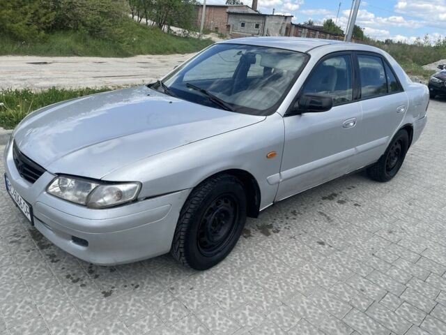 Серый Мазда 626, объемом двигателя 2 л и пробегом 300 тыс. км за 850 $, фото 1 на Automoto.ua