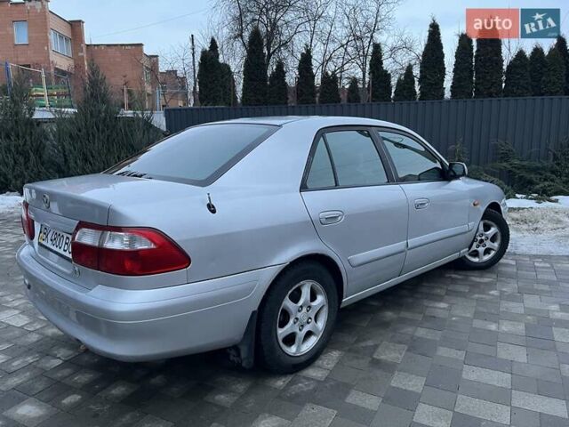 Серый Мазда 626, объемом двигателя 1.84 л и пробегом 320 тыс. км за 2250 $, фото 1 на Automoto.ua