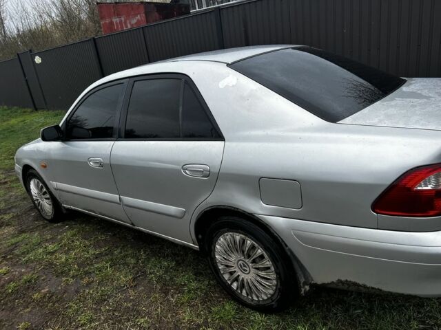 Серый Мазда 626, объемом двигателя 2 л и пробегом 457 тыс. км за 2800 $, фото 1 на Automoto.ua